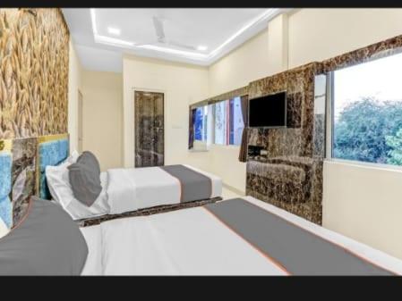 Hotel Bhavya Residency Amhedabad Oda fotoğraf